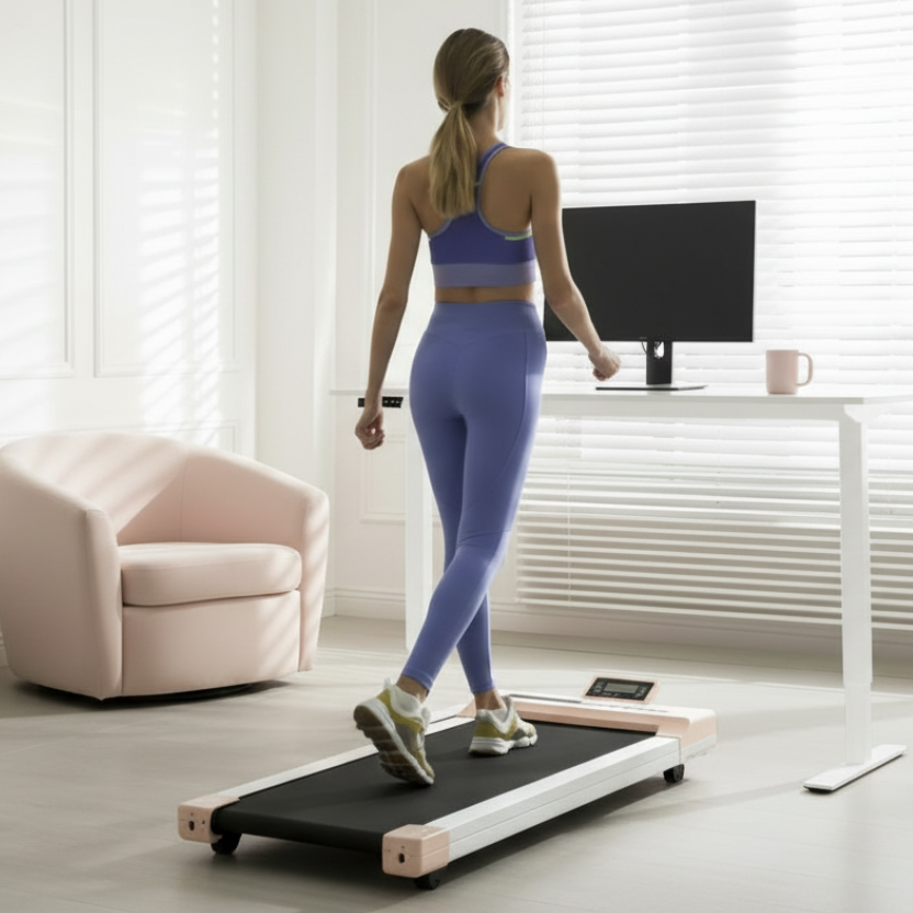 Woman using a treadmill in a home office setting